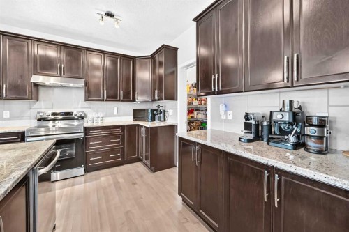 56 Panatella Parade Nw, Calgary, AB - Indoor Photo Showing Kitchen