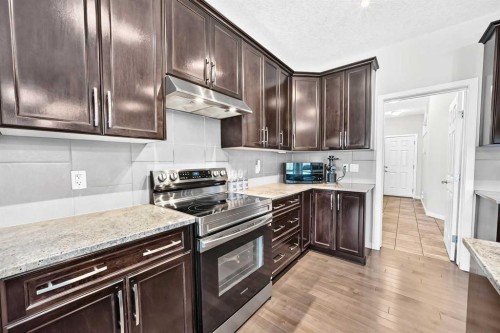 56 Panatella Parade Nw, Calgary, AB - Indoor Photo Showing Kitchen