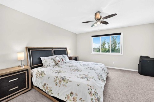 56 Panatella Parade Nw, Calgary, AB - Indoor Photo Showing Bedroom