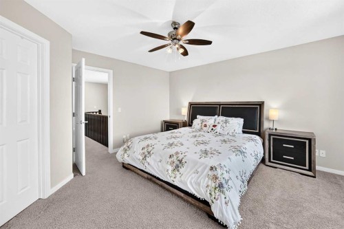 56 Panatella Parade Nw, Calgary, AB - Indoor Photo Showing Bedroom