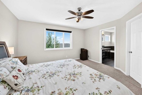 56 Panatella Parade Nw, Calgary, AB - Indoor Photo Showing Bedroom