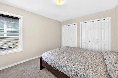 56 Panatella Parade Nw, Calgary, AB - Indoor Photo Showing Bedroom