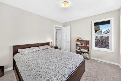 56 Panatella Parade Nw, Calgary, AB - Indoor Photo Showing Bedroom