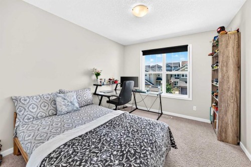 56 Panatella Parade Nw, Calgary, AB - Indoor Photo Showing Bedroom