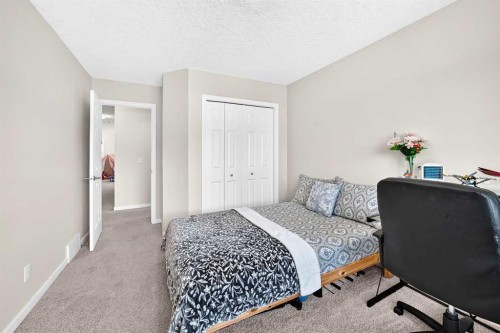 56 Panatella Parade Nw, Calgary, AB - Indoor Photo Showing Bedroom