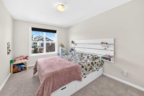 56 Panatella Parade Nw, Calgary, AB - Indoor Photo Showing Bedroom