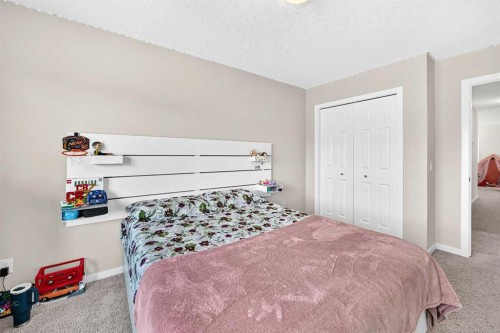 56 Panatella Parade Nw, Calgary, AB - Indoor Photo Showing Bedroom