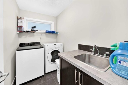 56 Panatella Parade Nw, Calgary, AB - Indoor Photo Showing Laundry Room
