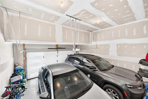 56 Panatella Parade Nw, Calgary, AB - Indoor Photo Showing Garage