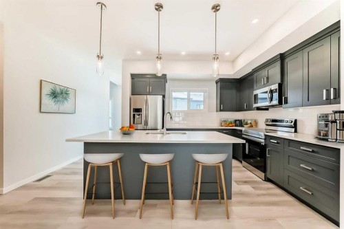 136-42 Cranbrook Gardens Se, Calgary, AB - Indoor Photo Showing Kitchen With Stainless Steel Kitchen With Upgraded Kitchen