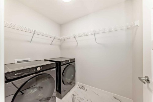 136-42 Cranbrook Gardens Se, Calgary, AB - Indoor Photo Showing Laundry Room