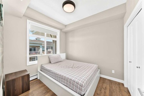 402-300 Auburn Meadows Common Se, Calgary, AB - Indoor Photo Showing Bedroom