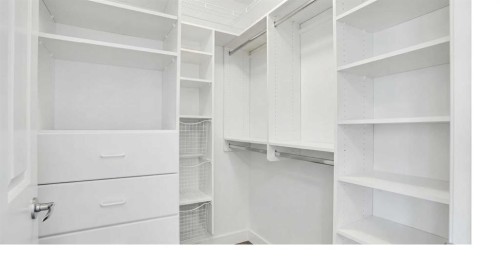 6 Discovery Woods Villas Sw, Calgary, AB - Indoor With Storage