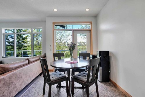6 Discovery Woods Villas Sw, Calgary, AB - Indoor Photo Showing Dining Room