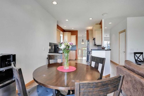 6 Discovery Woods Villas Sw, Calgary, AB - Indoor Photo Showing Dining Room
