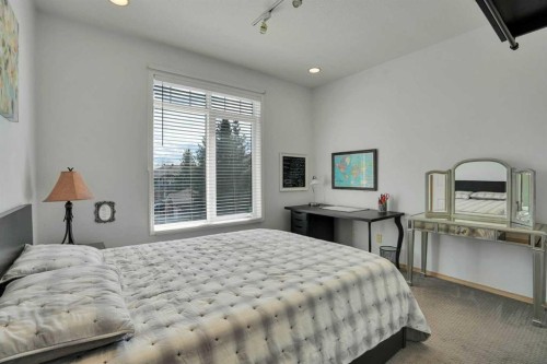 6 Discovery Woods Villas Sw, Calgary, AB - Indoor Photo Showing Bedroom