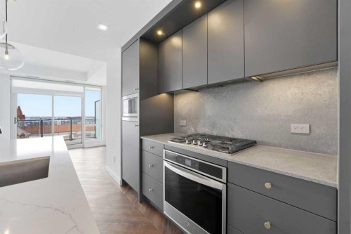 606-8445 Broadcast Avenue Sw, Calgary, AB - Indoor Photo Showing Kitchen
