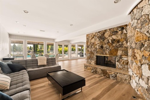 120 Lake Placid Green Se, Calgary, AB - Indoor Photo Showing Living Room With Fireplace