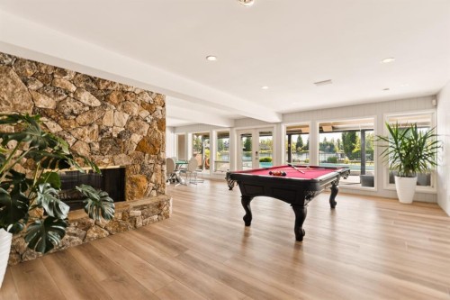 120 Lake Placid Green Se, Calgary, AB - Indoor Photo Showing Other Room With Fireplace