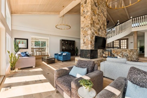 120 Lake Placid Green Se, Calgary, AB - Indoor Photo Showing Living Room With Fireplace