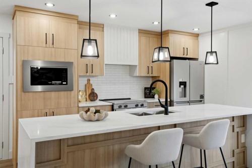 908 Stonehaven Road Sw, Calgary, AB - Indoor Photo Showing Kitchen With Double Sink With Upgraded Kitchen