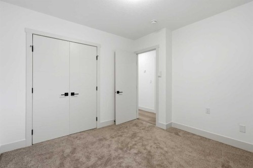 908 Stonehaven Road Sw, Calgary, AB - Indoor Photo Showing Other Room