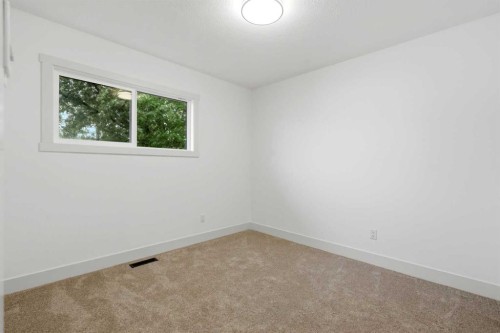 908 Stonehaven Road Sw, Calgary, AB - Indoor Photo Showing Other Room