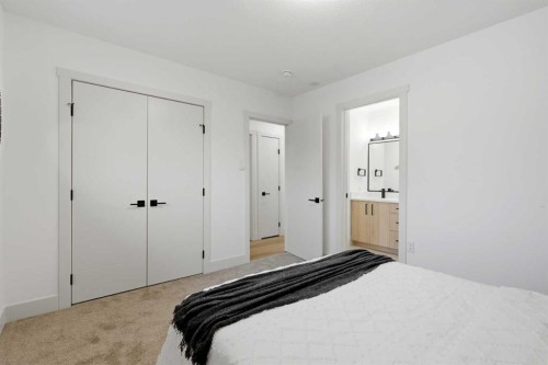908 Stonehaven Road Sw, Calgary, AB - Indoor Photo Showing Bedroom