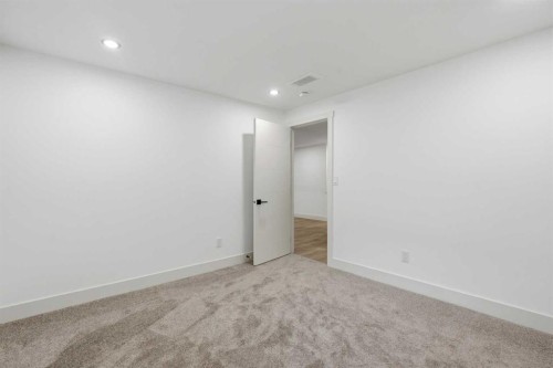 908 Stonehaven Road Sw, Calgary, AB - Indoor Photo Showing Other Room