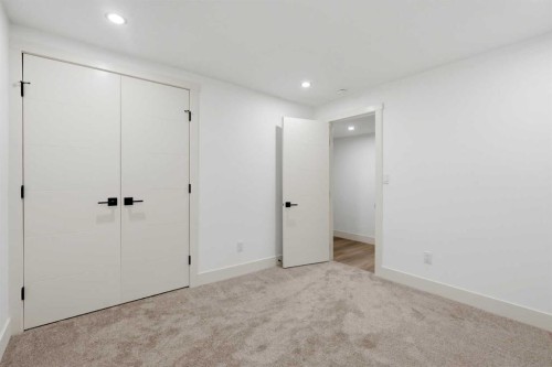 908 Stonehaven Road Sw, Calgary, AB - Indoor Photo Showing Other Room