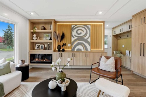 908 Stonehaven Road Sw, Calgary, AB - Indoor Photo Showing Living Room With Fireplace