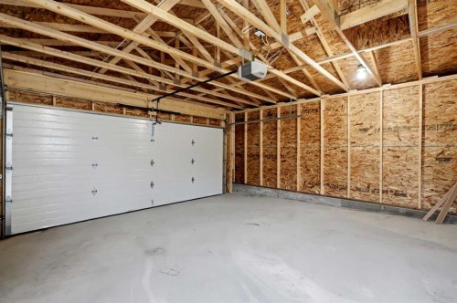 908 Stonehaven Road Sw, Calgary, AB - Indoor Photo Showing Garage