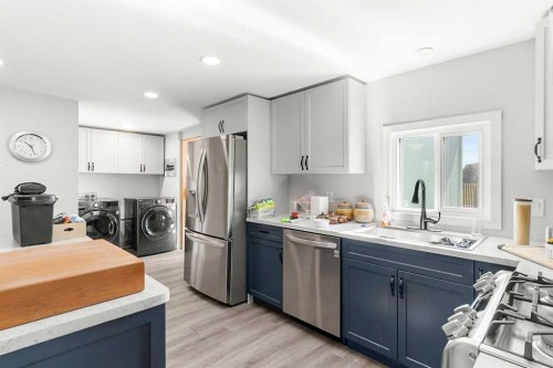 7 Tamarack Crescent Nw, Sundre, AB - Indoor Photo Showing Kitchen With Double Sink