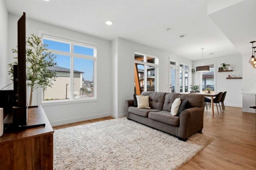 603-10060 46 Street Ne, Calgary, AB - Indoor Photo Showing Living Room
