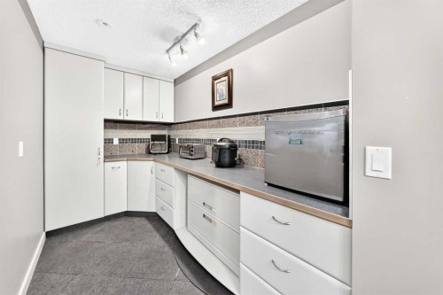 423 Rocky Ridge Drive Nw, Calgary, AB 