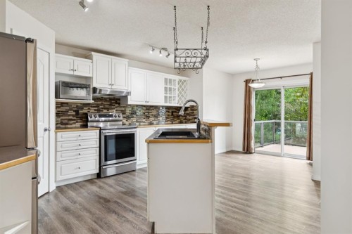 26 Spring Mews Sw, Calgary, AB 