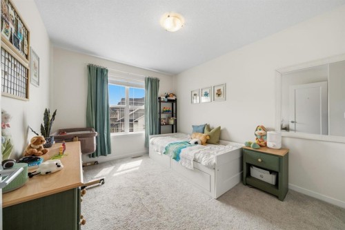 418 Copperstone Manor Se, Calgary, AB - Indoor Photo Showing Bedroom