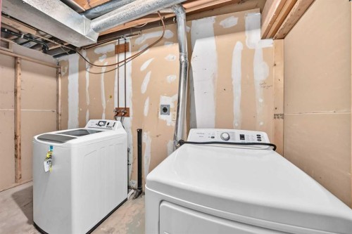 91 Cedarwood Hill Sw, Calgary, AB - Indoor Photo Showing Laundry Room
