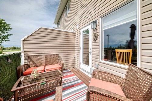 5-2002 22 Avenue, Bowden, AB - Outdoor With Deck Patio Veranda With Exterior