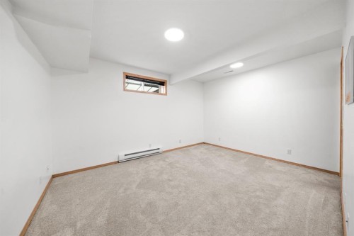 41 Bow Ridge Drive, Cochrane, AB - Indoor Photo Showing Other Room