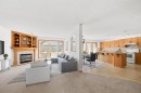41 Bow Ridge Drive, Cochrane, AB  - Indoor Photo Showing Living Room With Fireplace 
