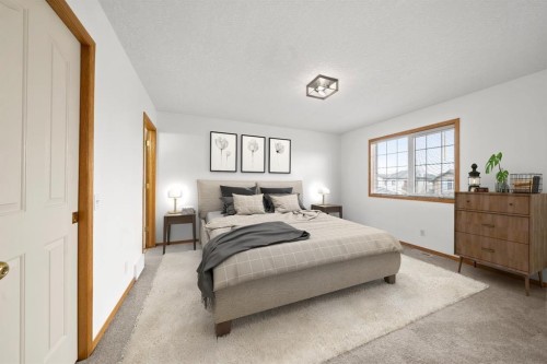 41 Bow Ridge Drive, Cochrane, AB - Indoor Photo Showing Bedroom