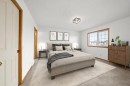 41 Bow Ridge Drive, Cochrane, AB  - Indoor Photo Showing Bedroom 