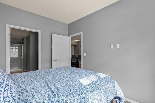 114-6703 New Brighton Avenue Se, Calgary, AB - Indoor Photo Showing Bedroom