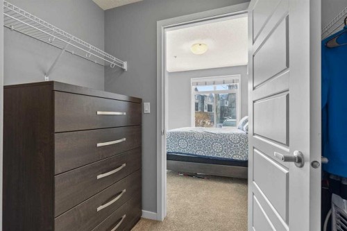 114-6703 New Brighton Avenue Se, Calgary, AB - Indoor Photo Showing Bedroom