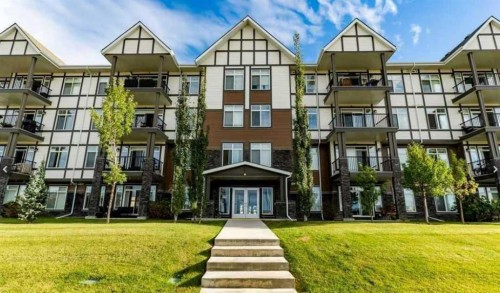 114-6703 New Brighton Avenue Se, Calgary, AB - Outdoor With Facade