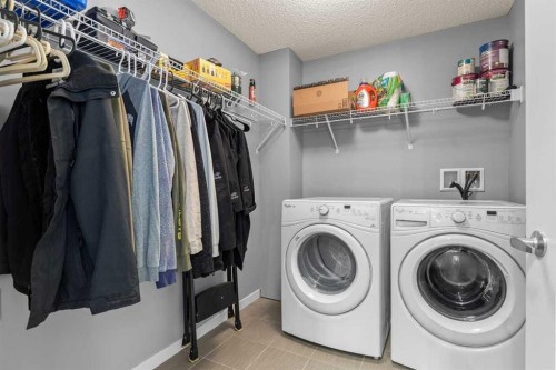 114-6703 New Brighton Avenue Se, Calgary, AB - Indoor Photo Showing Laundry Room