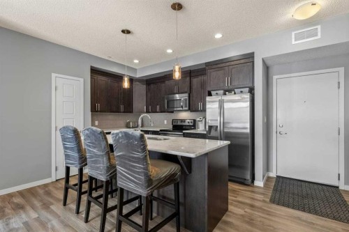 114-6703 New Brighton Avenue Se, Calgary, AB - Indoor Photo Showing Kitchen