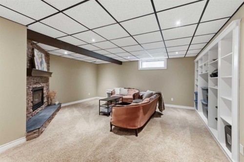 331 Queensland Circle Se, Calgary, AB - Indoor With Fireplace