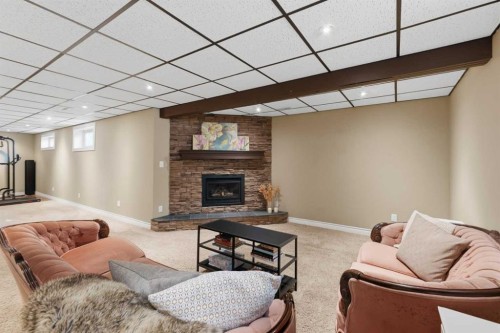 331 Queensland Circle Se, Calgary, AB - Indoor With Fireplace